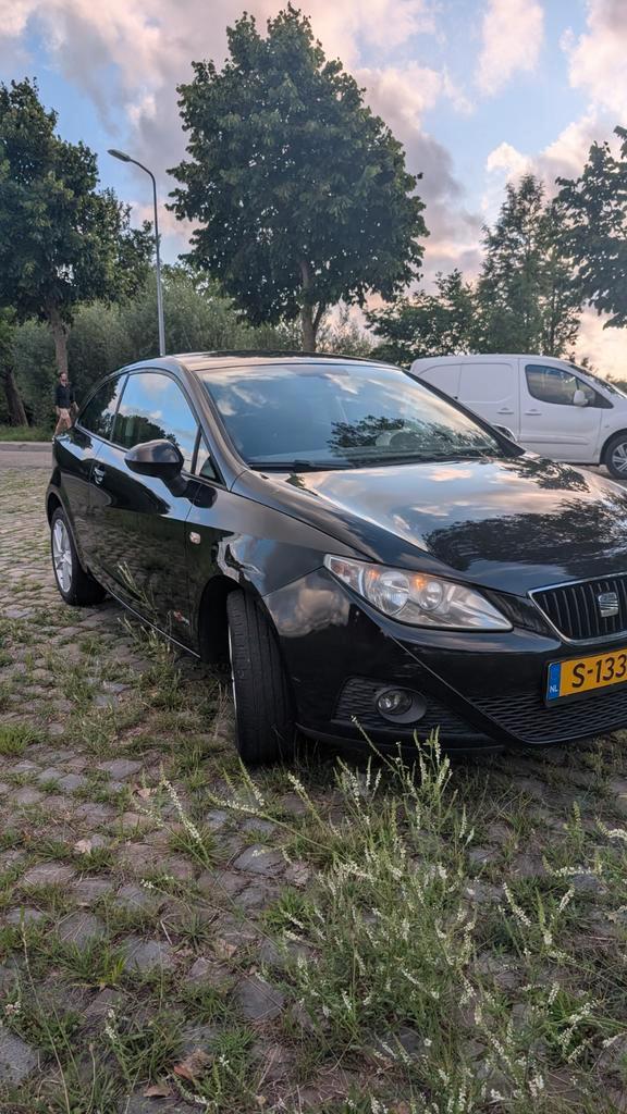 Seat Ibiza 1.2 51KW 2012 Zwart, Auto's, Seat, Particulier, Ibiza, ABS, Airbags, Airconditioning, Alarm, Bluetooth, Bochtverlichting
