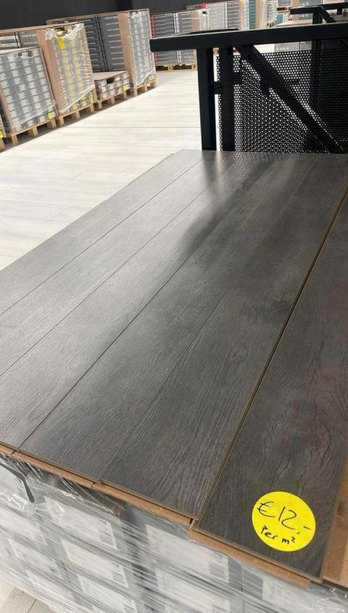 Outlet laminaat €12,- per m2 dikte 12mm! Nergens goedkoper, Huis en Inrichting, Stoffering | Vloerbedekking, Nieuw, Laminaat, Grijs