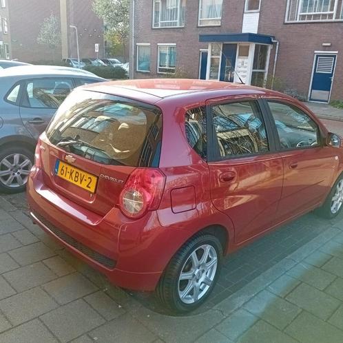 Chevrolet Aveo 1.2 16V 5D 2009 Rood, Auto's, Chevrolet, Particulier, Aveo, Airbags, Airconditioning, Elektrische ramen, Benzine