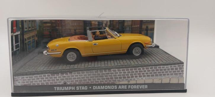 #18 Triumph Stag James bond auto met boekje, Hobby en Vrije tijd, Modelauto's | 1:43, Nieuw, Auto, Universal Hobbies, Verzenden