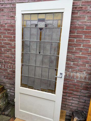 Deur met glas in lood beschikbaar voor biedingen
