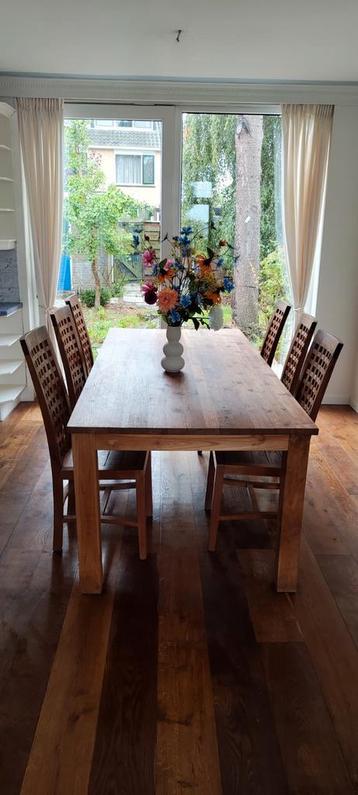 Lange teakhouten eettafel met 6 teakhouten stoelen  beschikbaar voor biedingen