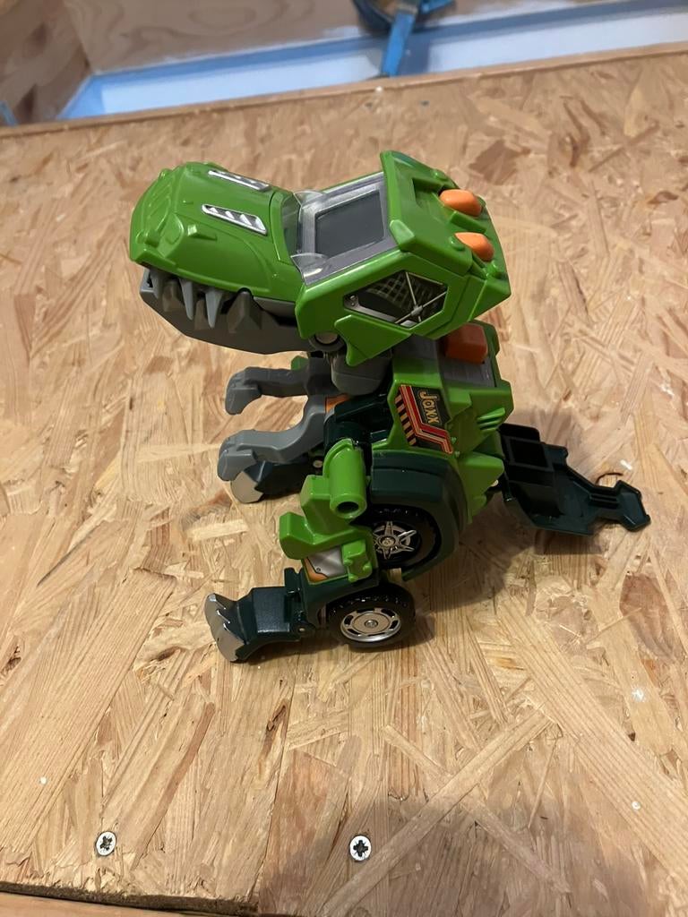 V-tech Jax de T-rex trasformeert van auto naar dino, Ophalen of Verzenden, Zo goed als nieuw
