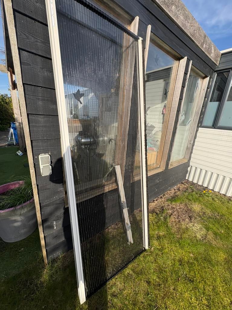 Unilux Rol hordeur in nette staat., Doe-het-zelf en Verbouw, Deuren en Horren, Ophalen, 80 tot 100 cm, 215 cm of meer, Hordeur