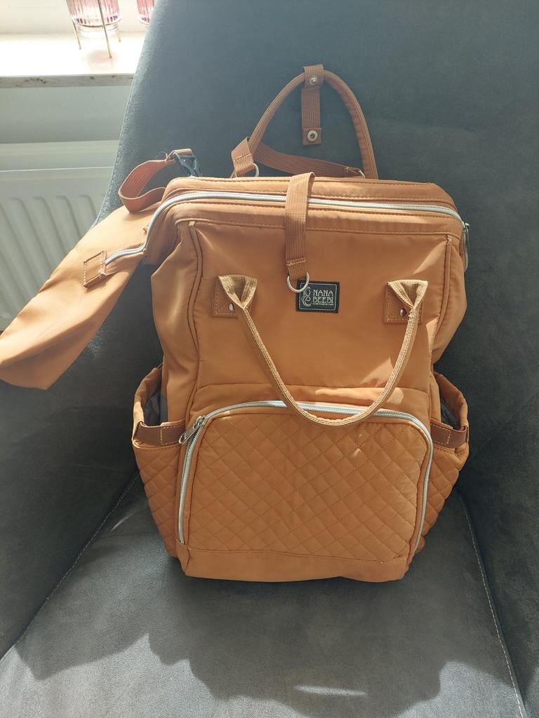 Luiertas cognac, Ophalen