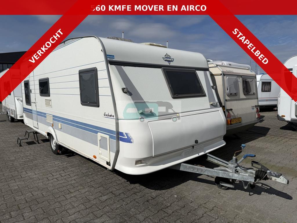 Hobby exclusive 560 KMFE Stapelbed (bj 2000), Caravans en Kamperen, Caravans, Hobby, Schokbreker, Bedrijf, Tot en met 6