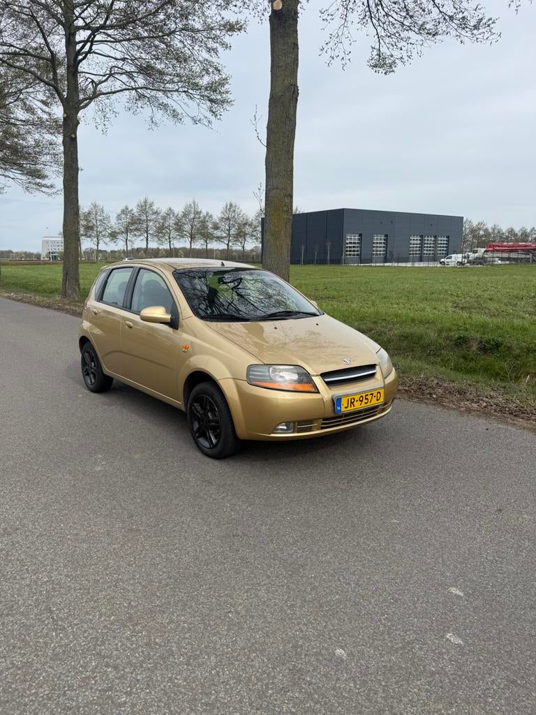 Daewoo Kalos 1.4 16V AUT 2003, Auto's, Daewoo, Stof, 40 €/maand, Elektrische ramen, 1010 kg