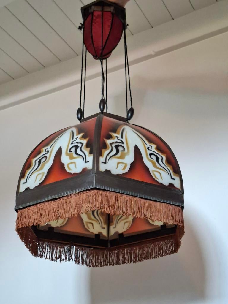 Amsterdamse school hanglamp, Ophalen
