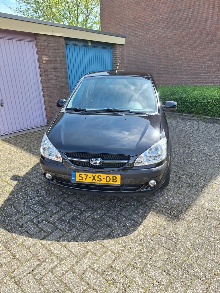 Hyundai Getz 1.4 5DRS 2007 Zwart 56750 kilometer, Auto's, Hyundai, Voorwielaandrijving, 450 kg, 40 €/maand, 4 cilinders