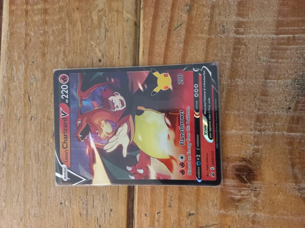 Charizard v promo, Ophalen of Verzenden, Zo goed als nieuw, Losse kaart, Foil