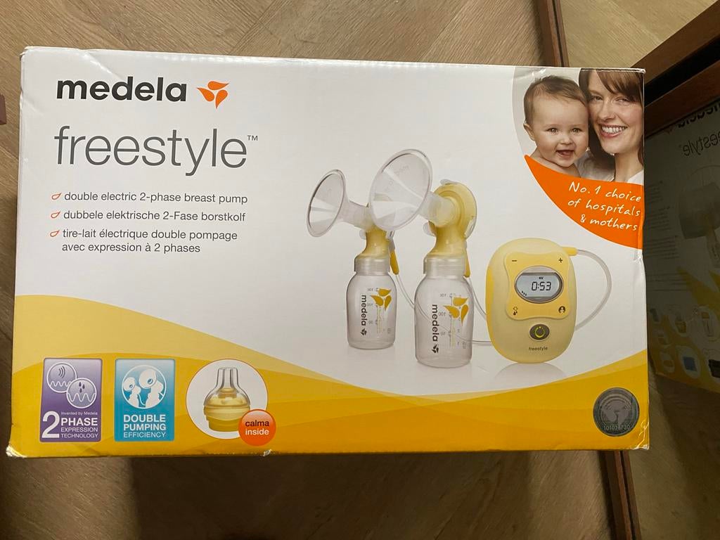 Medela Freestyle Dubbele Elektrische Borstkolf, Ophalen of Verzenden, Zo goed als nieuw, Borstkolf
