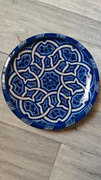 Handgemaakt Marokkaans wandbord, Ophalen