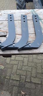 Tanden voor cultivator, Ophalen