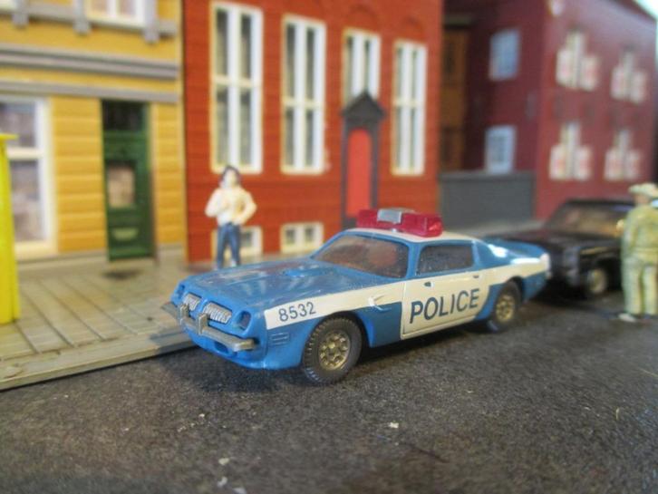 Pontiac Firebird Trans-Am - Praliné Police, Hobby en Vrije tijd, Modelauto's | 1:87, Gebruikt, Auto, Efsi, Ophalen of Verzenden