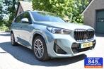 BMW X1 2.5 E Aut Hybrid M Sportpakket Cape York green met, Gebruikt, Overige carrosserieën, Bedrijf, Apple Carplay