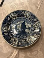 Delfts blauw bord,, Ophalen