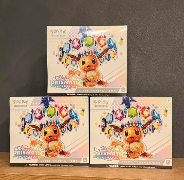 Prismatic Evolutions Elite Trainer Box, Hobby en Vrije tijd, Verzamelkaartspellen | Pokémon, Zo goed als nieuw, Ophalen of Verzenden