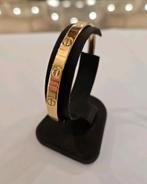 14 karaats gouden bangle / slavenarmband Cartier motief, Ophalen of Verzenden, Zo goed als nieuw, Goud, Goud