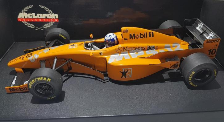 F1 McLaren MP4/12 Oranje Test David Coulthard Boxed 1/18, Hobby en Vrije tijd, Modelauto's | 1:18, Zo goed als nieuw, Auto, MiniChamps