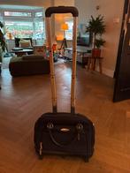 Reiskoffertje, Ophalen, Gebruikt