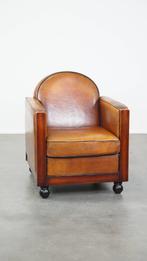 Schapenleren en houten Art Deco design fauteuil met bolpoten, Ophalen, Gebruikt, Art Deco, 50 tot 75 cm