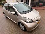 Toyota Aygo 1.0 12V Vvt-i 5DRS 2007 Bruin, Auto's, Voorwielaandrijving, Zwart, Bruin, 4 stoelen