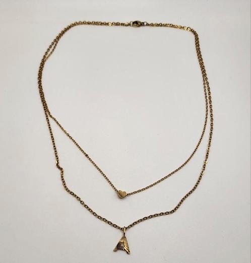 Goudkleurige, dubbele ketting met hartje en letter, Sieraden, Tassen en Uiterlijk, Kettingen, Nieuw, Overige materialen, Goud