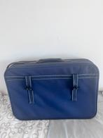 Blauwe koffer, Ophalen