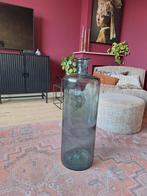 Grote blauwe glazen vaas, Ophalen