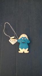 Portefeuille Platte smurf in PVC, Verzamelen, Smurfen, Ophalen of Verzenden, Gebruikt, Overige Smurfen, Poppetje, Figuurtje of Knuffel