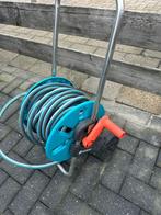 Karwei tuinslang op haspel, Tuin en Terras, Tuinslangen, Ophalen of Verzenden, Gebruikt, Tuinslang