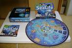 sealive bordspel met 4 duikers 2dvd,s in blik met speluitleg, Hobby en Vrije tijd, Een of twee spelers, Ophalen of Verzenden, Zo goed als nieuw