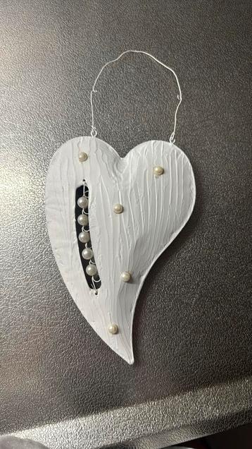 Hart met parels beschikbaar voor biedingen