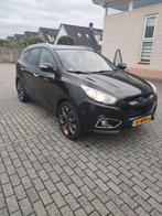 Te koop hyundai İX 35 automaat bij 2010, Auto's, Hyundai, 4 cilinders, Zwart, Leder, Particulier