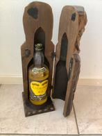 Houten beeld met verborgen drankkastje, Ophalen