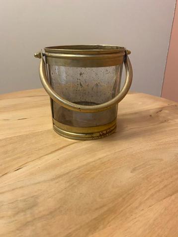 Gouden waxinelichthouder met handvat