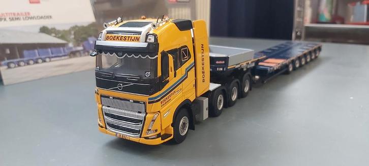 Volvo fh5 globe 8x4 +semi dieplader 6 asser boekestijn wsi, Hobby en Vrije tijd, Modelauto's | 1:50, Nieuw, Bus of Vrachtwagen