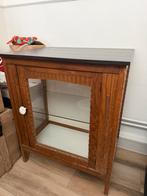 Glazen woonkamer kastje, Ophalen