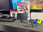 Nintendo Switch OLED + 2 Controllers + tas, Spelcomputers en Games, Spelcomputers | Nintendo Switch, Switch OLED, Met 2 controllers