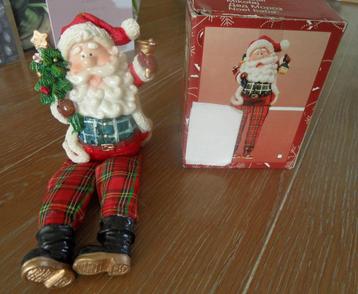 Leuke porseleinen kerstman, kan zitten beschikbaar voor biedingen
