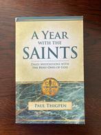 A year with the saints - Paul Thigpen, Ophalen of Verzenden, Zo goed als nieuw