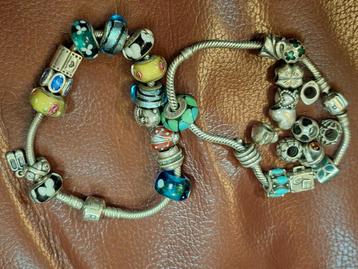 Pandora Bedelarmbanden met diverse bedels beschikbaar voor biedingen