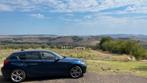 BMW 1-Serie 118I 125KW 5DR Aut8 2012 Blauw, Auto's, Zwart, 4 cilinders, 1290 kg, Blauw