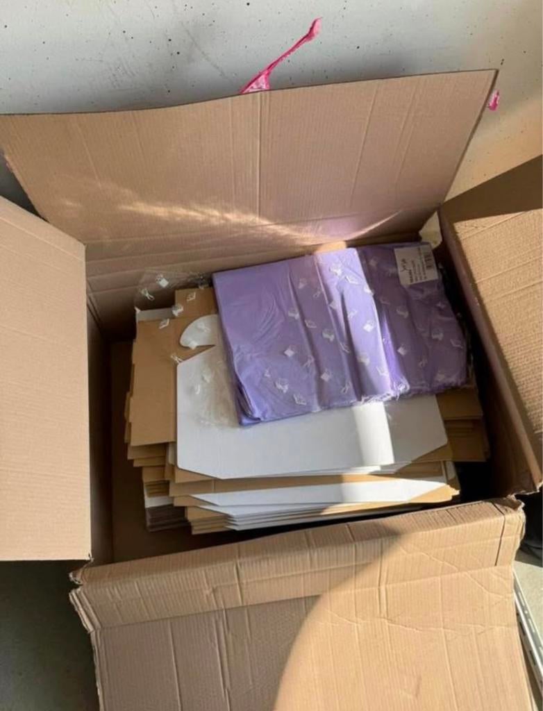 50 verzenddozen + vloeipapier, Ophalen