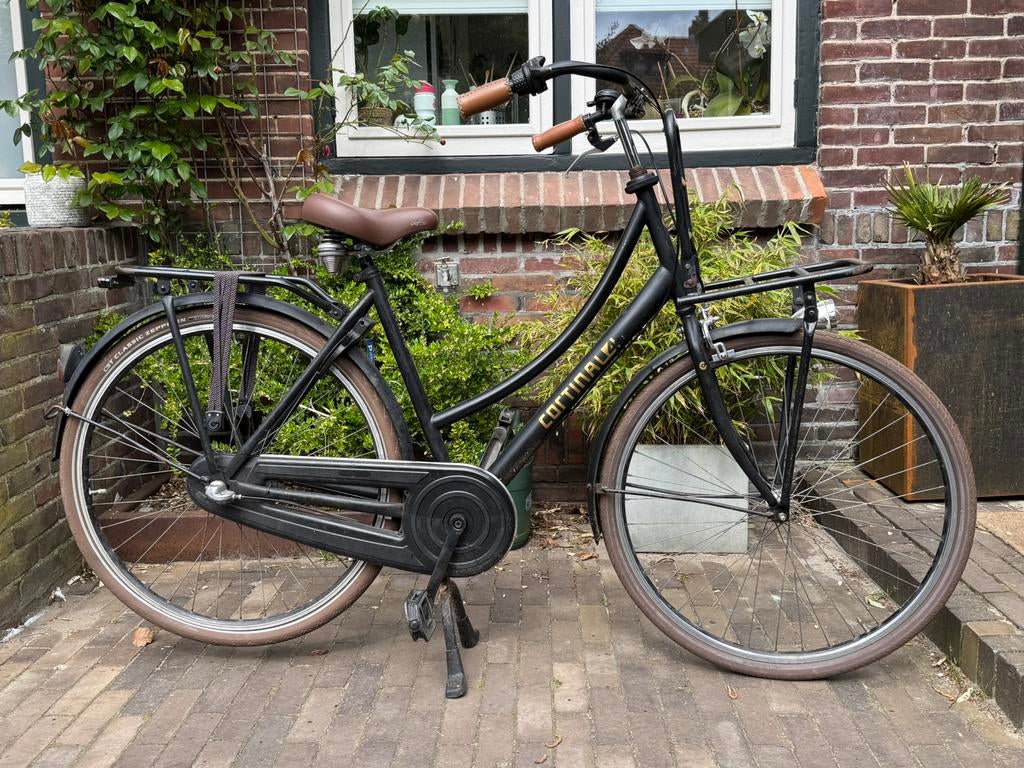 Zwarte Cortina fiets met zacht bruin zadel met versnellingen, Fietsen en Brommers, 56 cm of meer, Ophalen, Gebruikt, Versnellingen