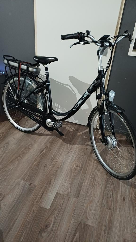 VOGUE Primium N7 Elektrische Fiets 28" D52. 7 vers, Zo goed als nieuw, 51 tot 55 cm, 50 km per accu of meer, Ophalen