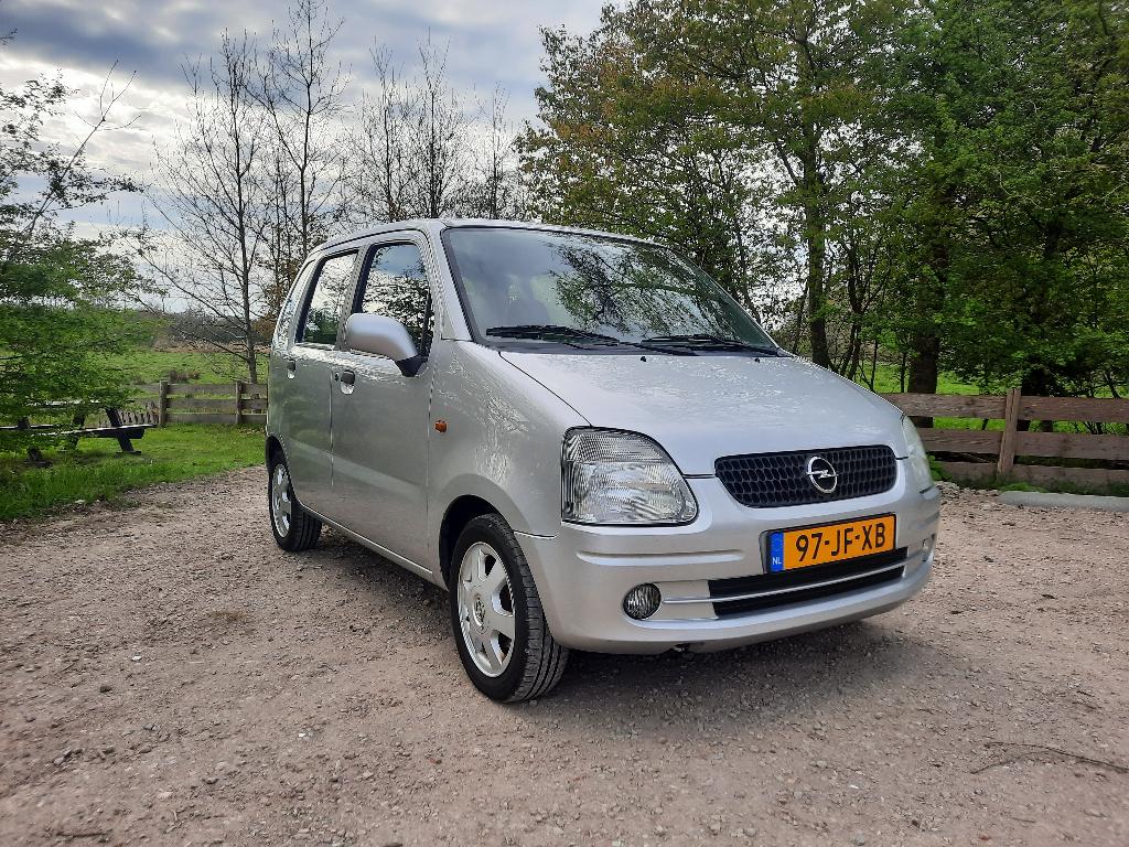 Opel Agila 1.2 I 16V 2002 Grijs, Auto's, Voorwielaandrijving, 15 km/l, 74 pk, 31 €/maand