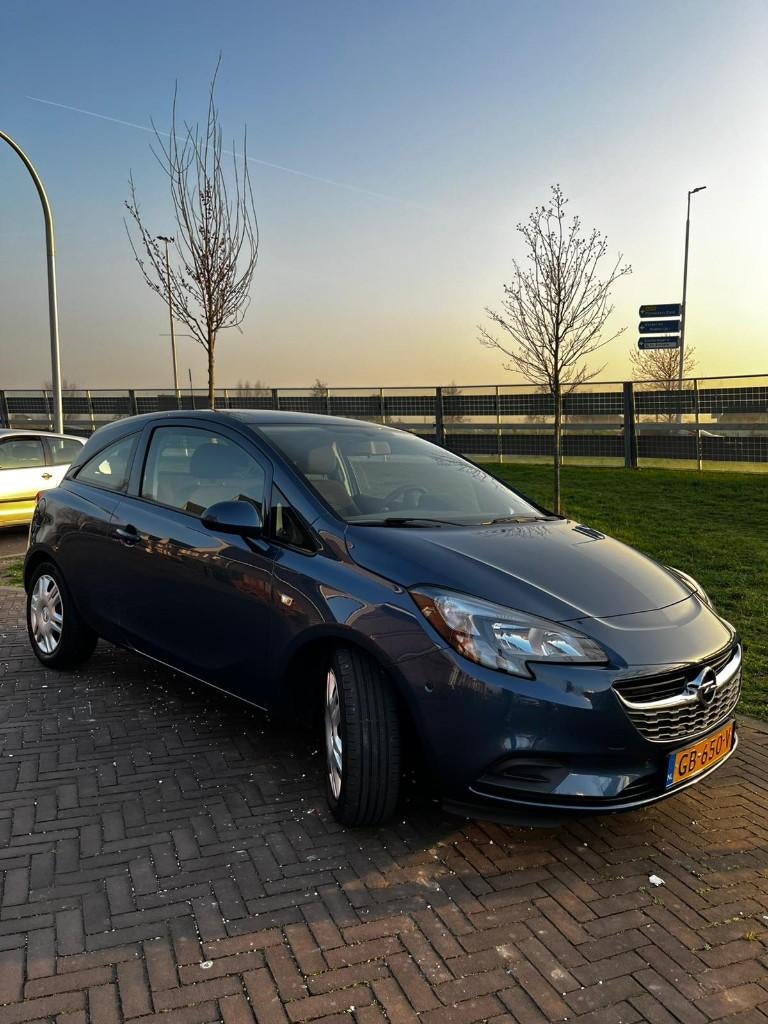 Opel Corsa 1.4 66KW/90PK 3D Easytronic 2015 Blauw, Auto's, Stof, 40 €/maand, Blauw, Origineel Nederlands
