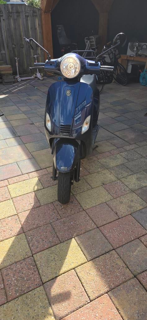 Blauwe scooter, Ophalen of Verzenden