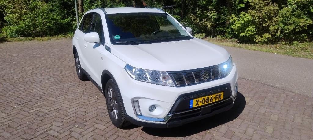 Suzuki Vitara 1.0 Boosterjet 112pk 2WD Aut 2018 Wit, Stof, Multifunctioneel stuurwiel, Zwart, 400 kg